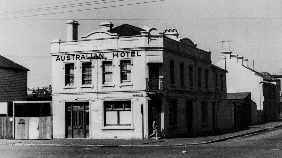 Black and white photo of the Australian Hotel on the corner.
