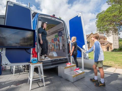Sydney Metro Community Engagement Van with open doors at an event
