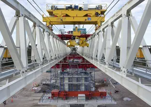 A view down the white skytrain bridge that's under construction at Tallawong Station.