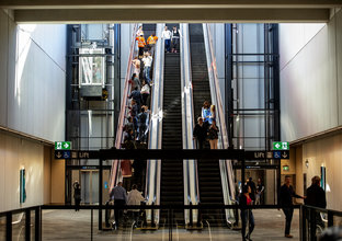 An on the ground view of commuters using the escalators at Sydney Metro's Castle Hill Station in March 2019. 