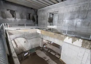 A view from above looking down into the Chatswood Dive cassette structure and the start of the metro train tunnel.