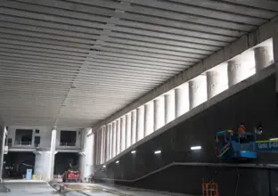 Construction workers on a forklift working inside the Chatswood dive site which was the launch pad for two of the tunnel boring machines (TBMs) on the City & Southwest project.