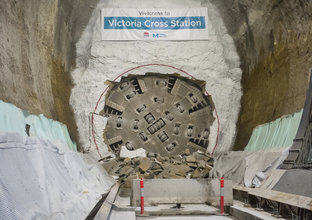 An on the ground view of Tunnel Boring Machine (TBM) Wendy breaking through at Sydney Metro's Victoria Cross Station.