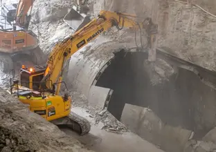 A heavy machine is breaking through to the Central Station metro box from above.