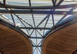 A close up view at the wooden and steel canopy roof at Castle Hills Station.