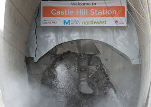 An on the ground view showing Tunnel Boring Machine (TBM) 2 Florence final break through the stone at Sydney Metro's Castle Hill Station. 