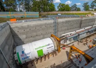 An aerial view looking down at Tunnel Boring Machine (TBM) 3 Isabelle beginning the tunnelling project at Sydney Metro's Cherrybrook Station as part of the North West Rail Link. 