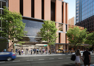An artist’s impression of the street view of Pitt Street Station’s southern entry and integrated station development, being delivered as part of the Sydney Metro City & Southwest project.