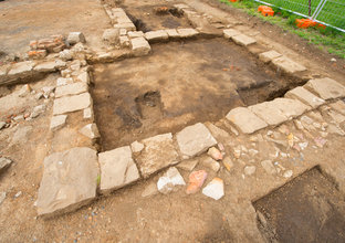 An aerial view of an archaeological dig at White Hart Inn site.