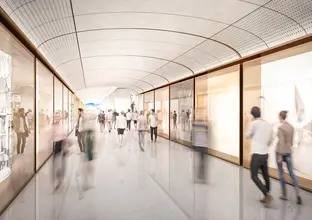 An Artist's impression of commuters walking along the pedestrian link of Sydney Metro's Martin Place Station. 