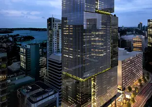 An artist's impression from above looking down at Sydney Metro's Victoria Cross Station over station development building at night.