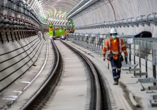 A safety walkway is installed inside the Sydney Metro tunnels just north of the Blues Point access shaft.