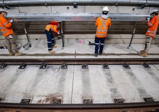 A safety walkway is installed inside the Sydney Metro tunnels just north of the Blues Point access shaft.