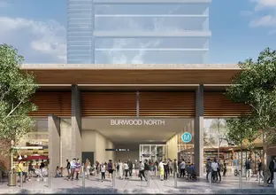 Artist's impression of commuters travelling in and out of Sydney Metro's Burwood North Station.