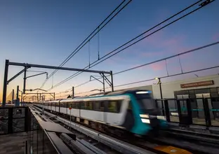 Sydney Metro train arriving at the platform at Sydney Metro's Rouse Hill Station. 