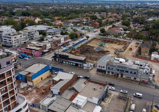 A bird's eye view of the excavation works at Sydney Metro's Burwood North Station construction site.