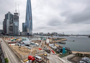 Wide lens view of construction works on the surface level of the construction site at Barangaroo station
