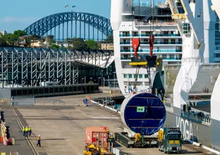 Cargo ship unloading front shield component of a tunnel boring machine (TBM) at White Bay, Sydney.