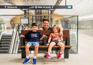 Family sitting at the platform seat