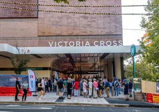 People gathering at the opening of the Victoria Cross station