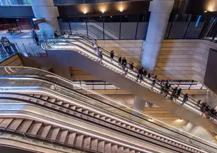 Image of escalators showing guests of the Open Day going up and down