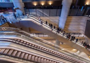 Image of escalators showing guests of the Open Day going up and down