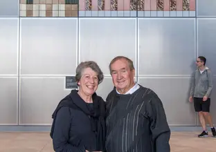 Couple in front of the Crows Nest station art