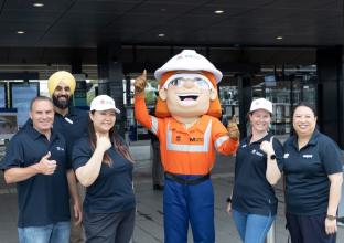 Sydney Metro emplyees with the mascot at the Sydenham Community Open Day Dec 2023