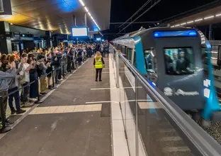 People waiting at the Sydenham Station on the City and Southwest Opening