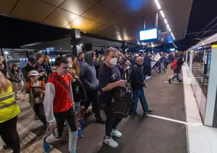 people getting on the the metro at Sydenham Station