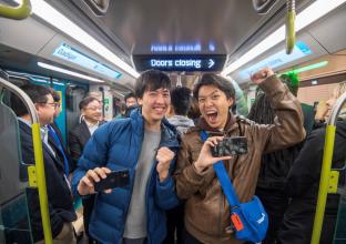 two young man in the newly opened Sydney Metro of the city line