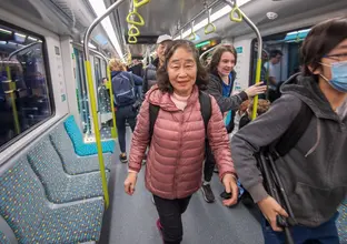 Passenger walking in the newly opening Metro in the city line