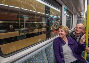 two passengers at the newly opened City line metro 