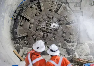 TBM Betty breakthrough seen by two workers