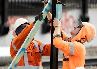 two workers at a project site