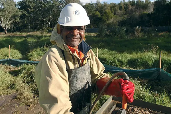 Aboriginal community representative wet sieving archaeological deposits