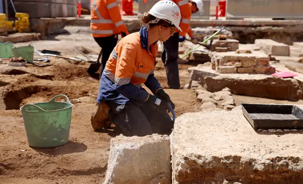 An on the ground view looking across at the excavation site where archaeological work is being completed at Sydney Metro's Parramatta construction site.