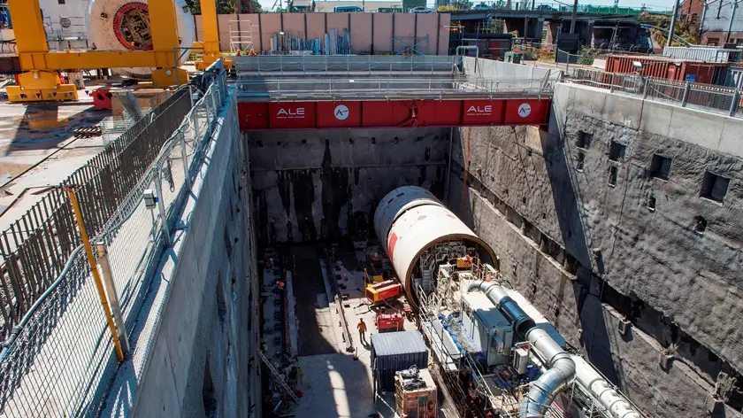 An above the ground view looking down at tunnel boring machine beginning work at Sydney Metro's Marrickville Station. 