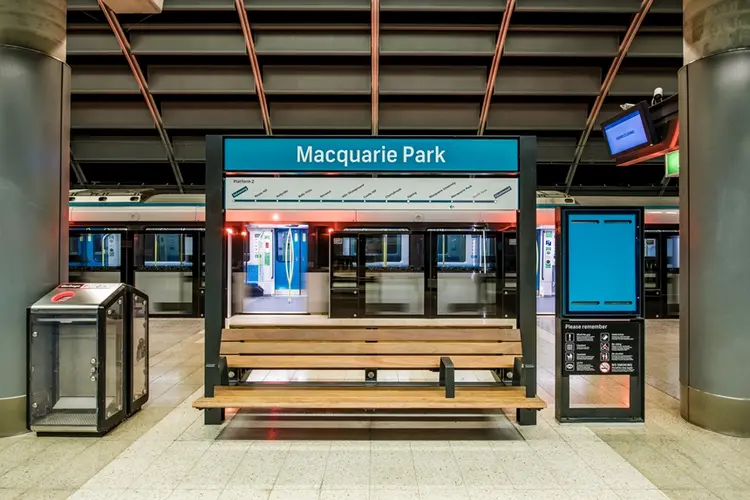 An artist's impression from the platform looking at the platform benches at Sydney Metro's Macquarie Park Station.