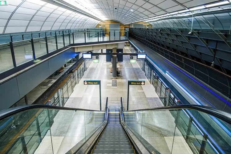 A view from above looking down the escalators at the completed platform at Sydney Metro's Macquarie University Station.