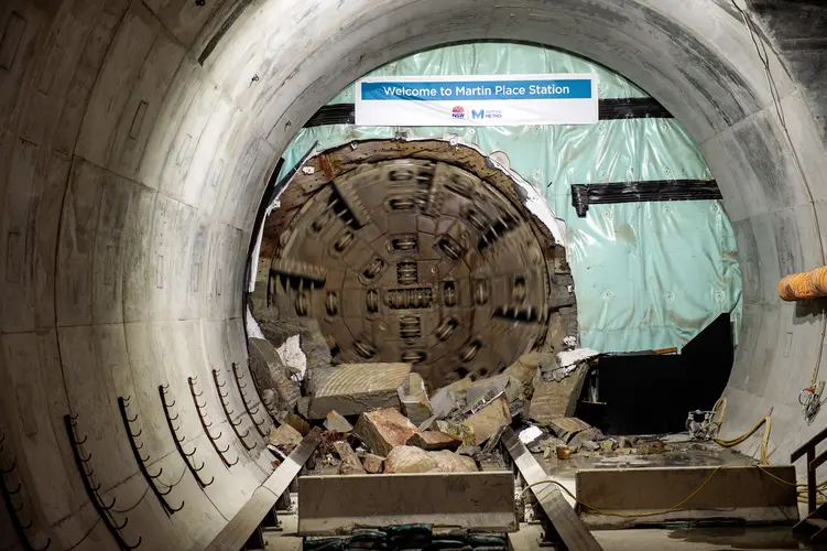 The cutterhead of tunnel boring machine Nancy can be seen breaking through the wall at Martin Place Station. 