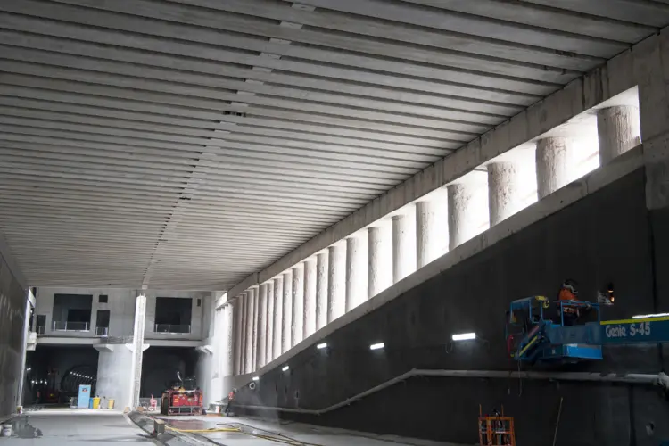 Construction workers on a forklift working inside the Chatswood dive site which was the launch pad for two of the tunnel boring machines (TBMs) on the City & Southwest project.