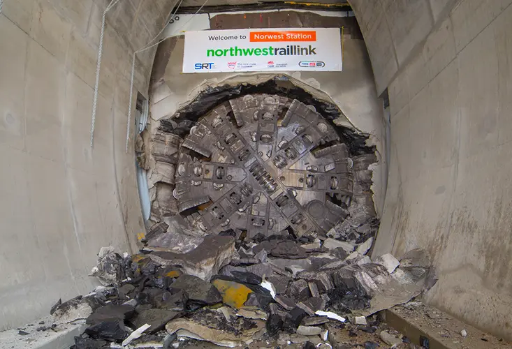 An on the ground view showing Tunnel Boring Machine (TBM) 1 Elizabeth final break through the stone at Sydney Metro's Hills Norwest Station as part of the North West Rail Link project. 