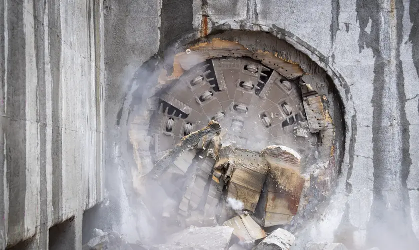 FB: Our mega borer Nancy has finished the job, arriving at Barangaroo Station in spectacular fashion through a wall of sandstone. More here: [link to latest news]