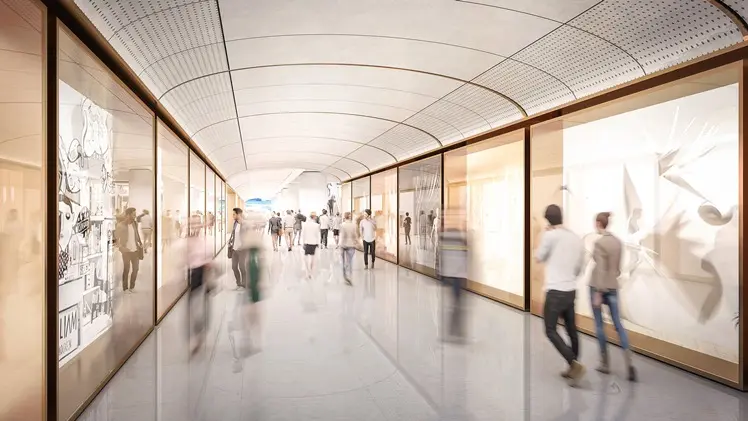 An Artist's impression of commuters walking along the pedestrian link of Sydney Metro's Martin Place Station. 