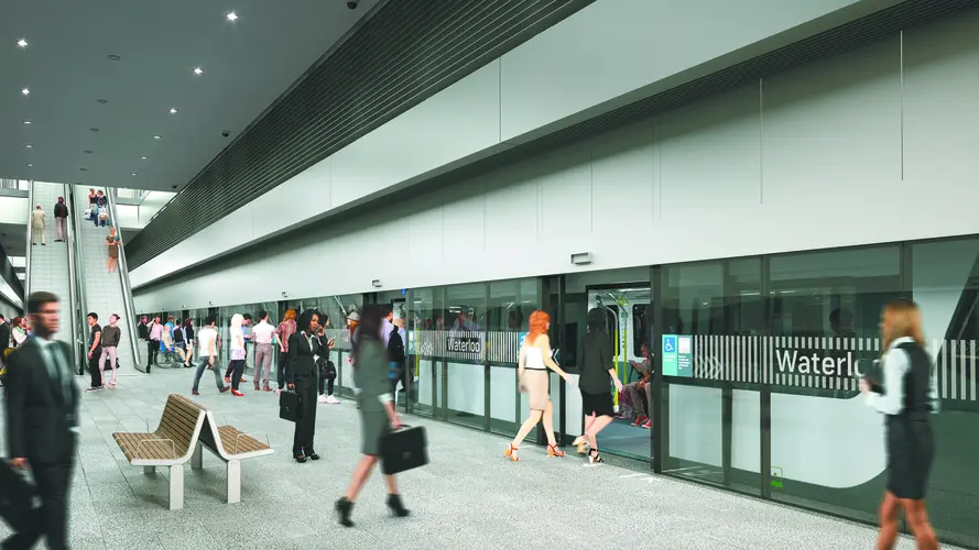 An artist's impression of commuters walking outside of Sydney Metro's Waterloo Station. Pink cherry blossom trees line the station entrance.