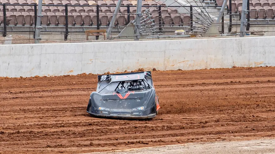 A race car drives in the dirt track at the new Eastern Creek Speedway.