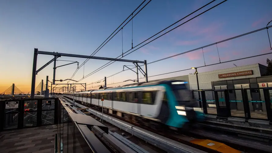 Sydney Metro train arriving at the platform at Sydney Metro's Rouse Hill Station. 