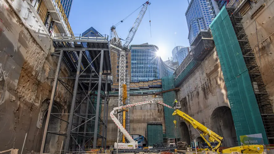 Crane and heavy machinery at construction site