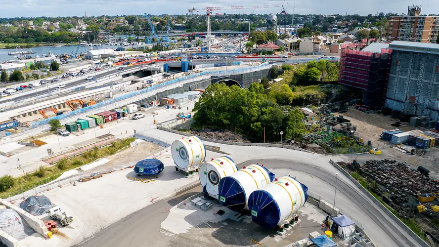 Aerial shot of four tunnel boring machine cutterheads at The Bays construction site